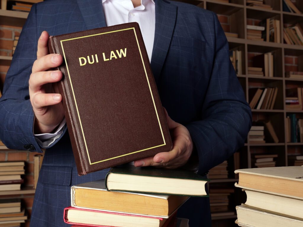 DUI LAW book in the hands of a attorney. OVI lawyer prepared to help someone with an ovi charge